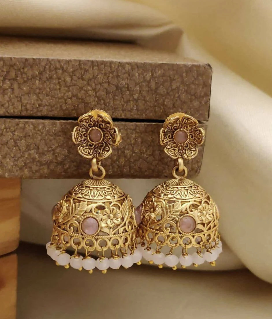 Elegance Redefined: The Timeless Charm of Golden Jhumkas