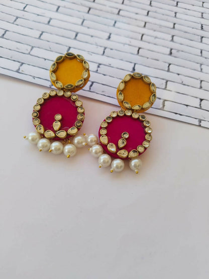 pink and yellow circle earrings