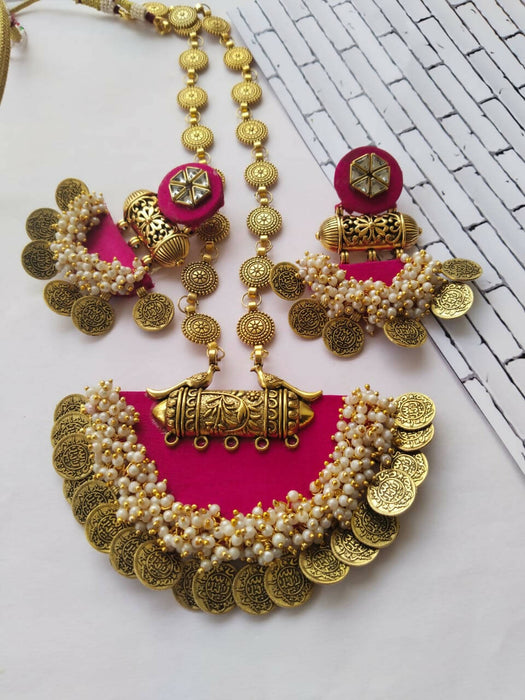 Pink coin necklace with earrings