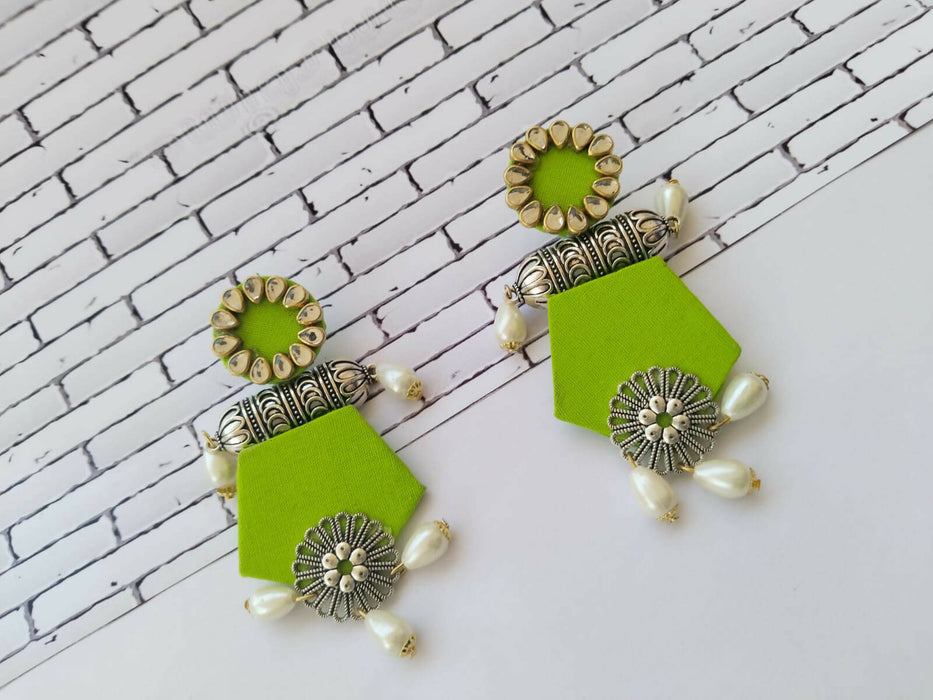 Green long earrings with pearls