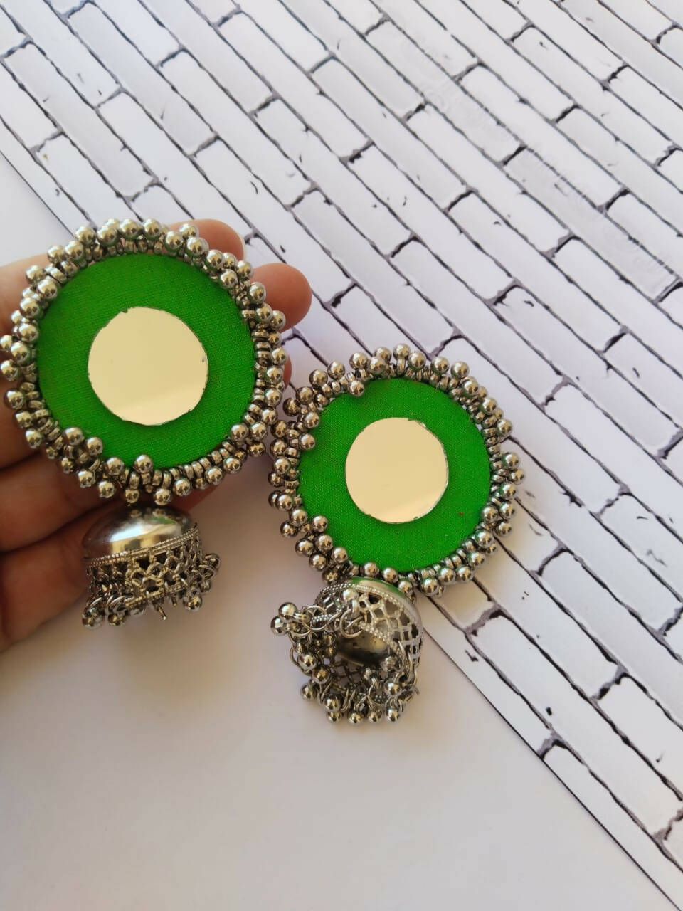 Green jhumka earrings