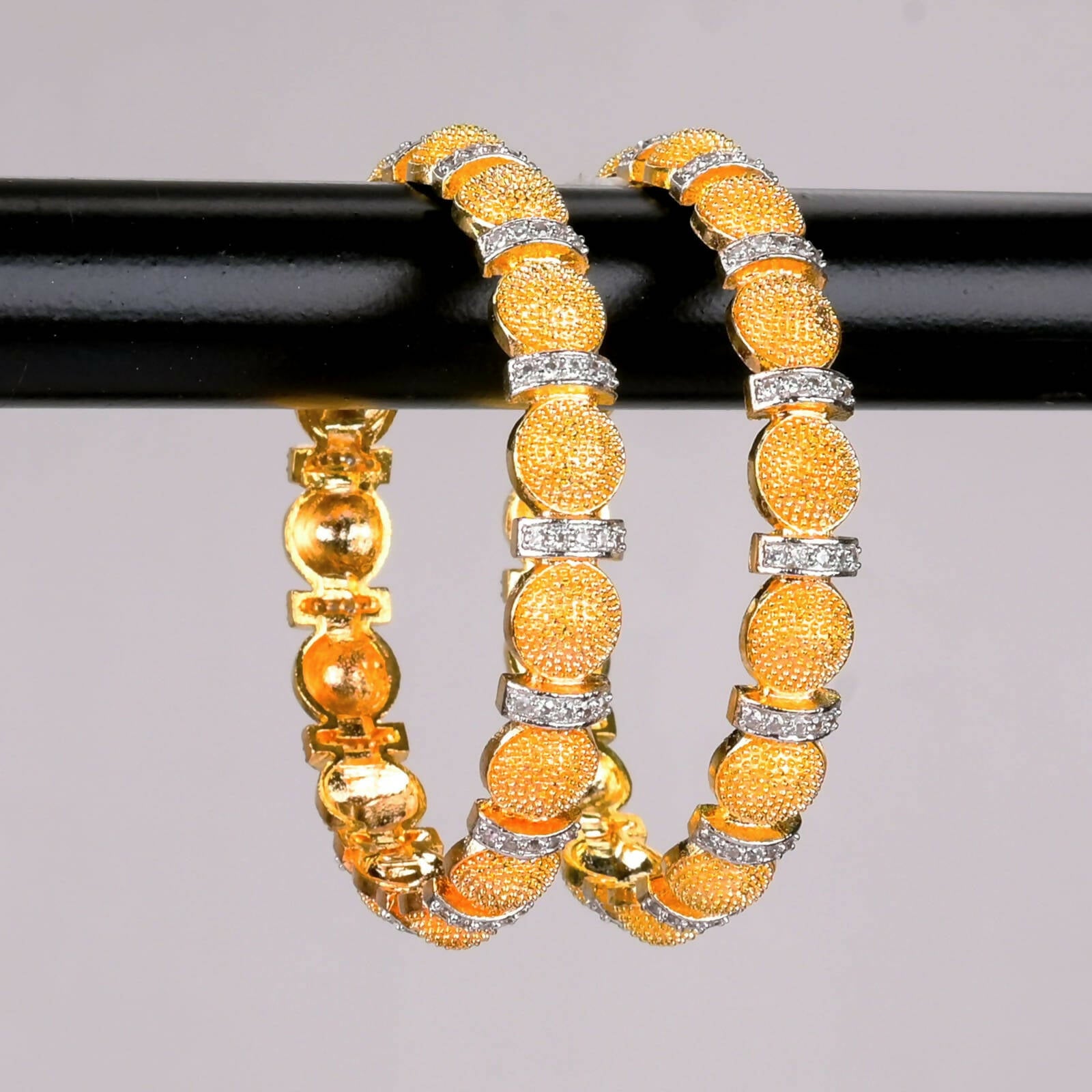 Golden motif bangles