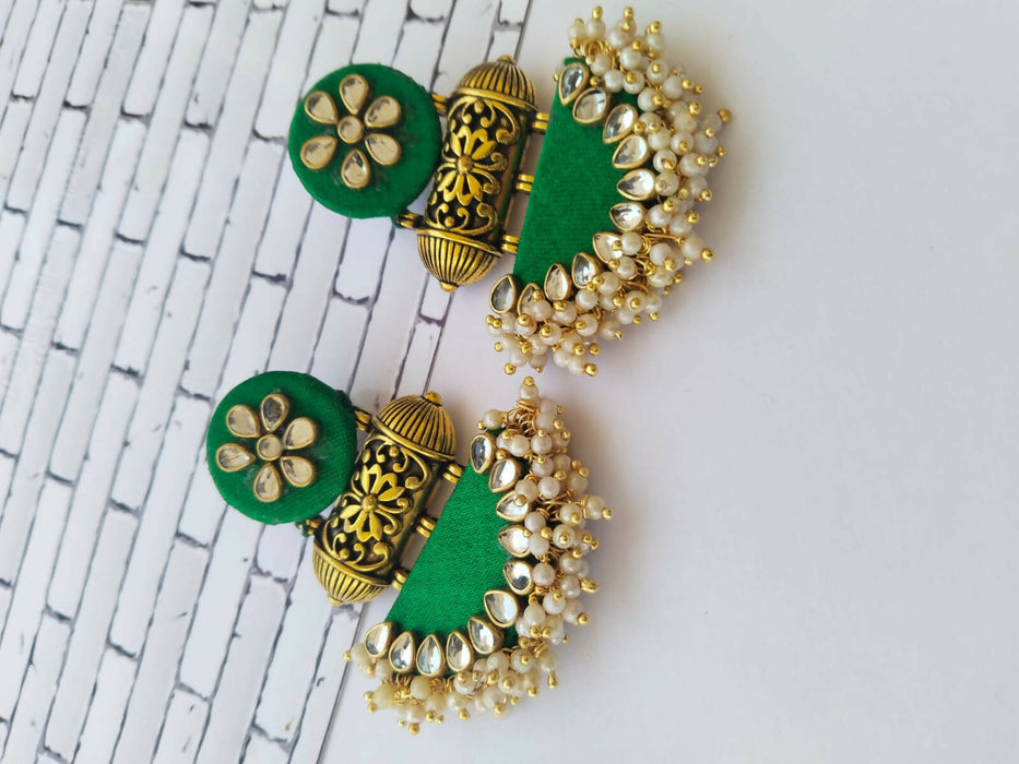 Green kundan with semi circle earrings