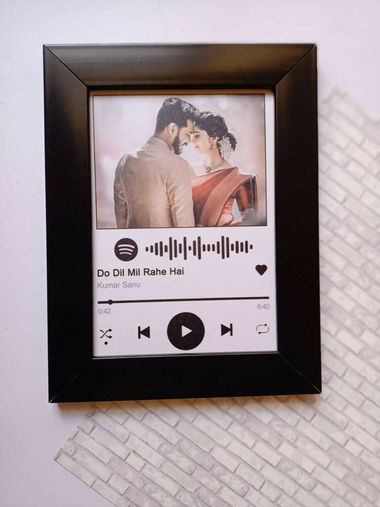 Black frame customized with photo for him and her
