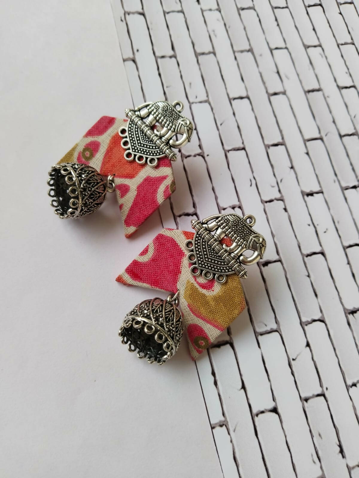Pink jhumka earrings
