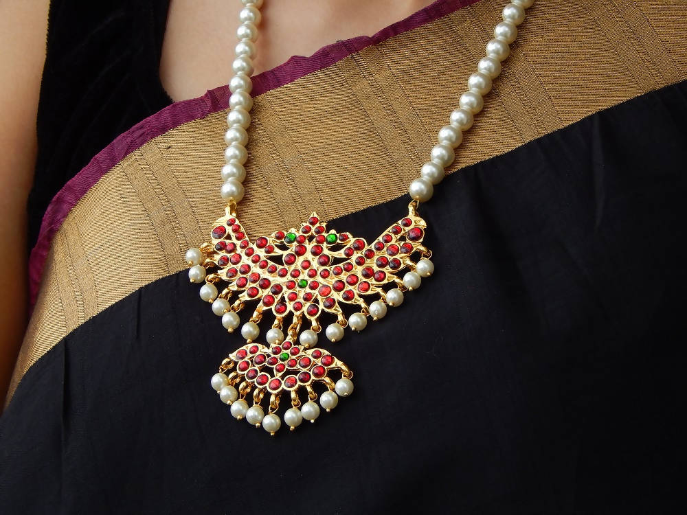 Maroon Kemp Pheonix pendant with White pearl Necklace Set by Nishna Designs