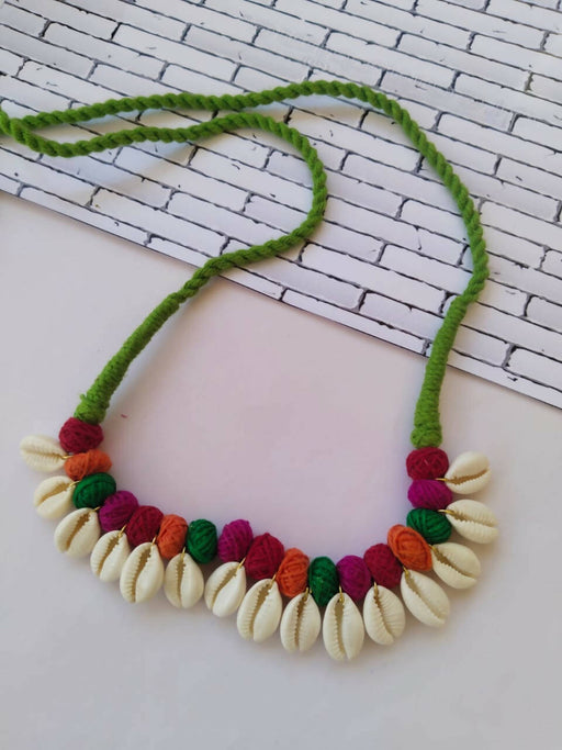 pom pom shell necklace