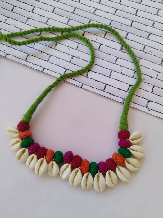 pom pom shell necklace