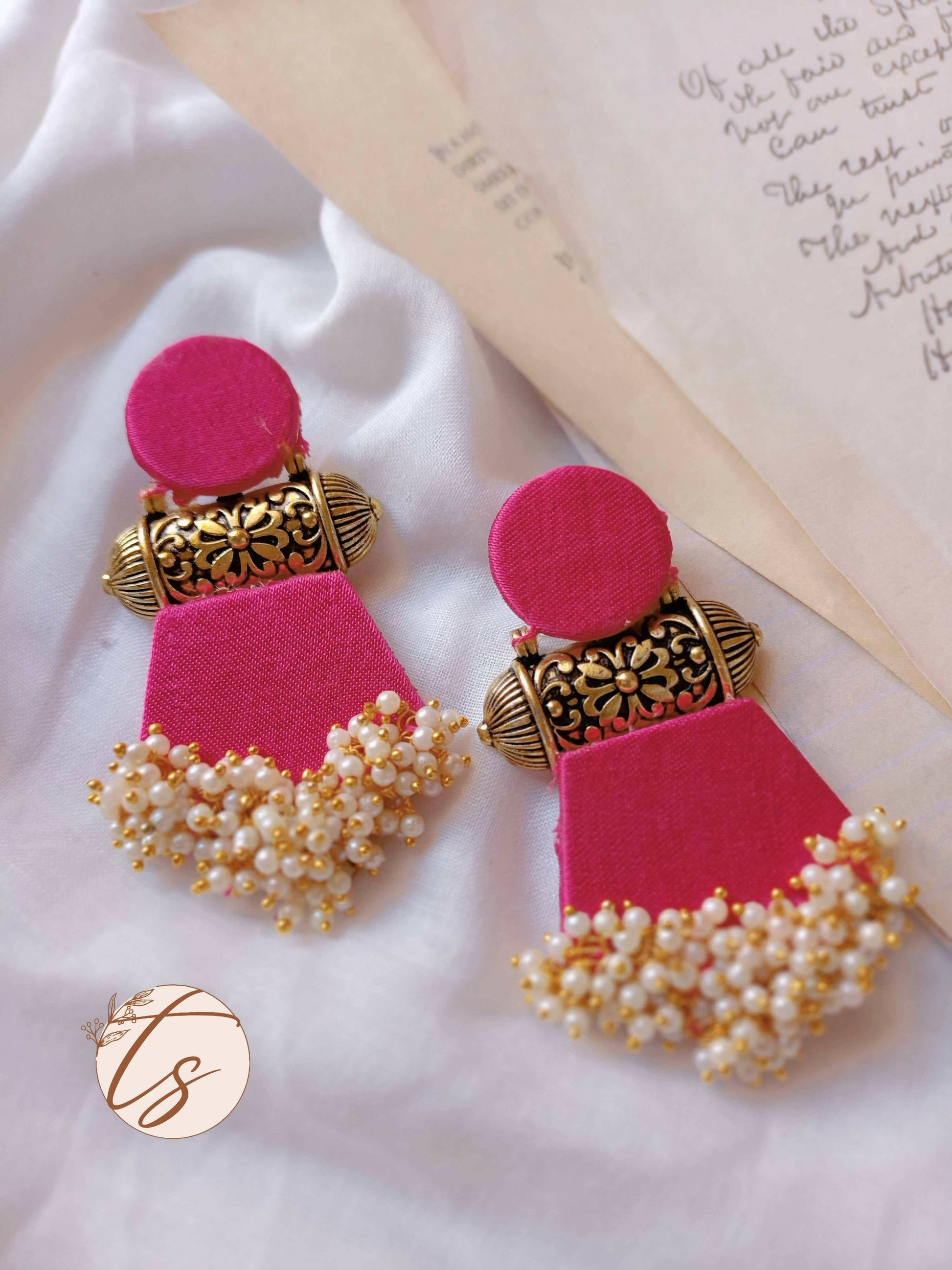 pink and gold jhumka earrings