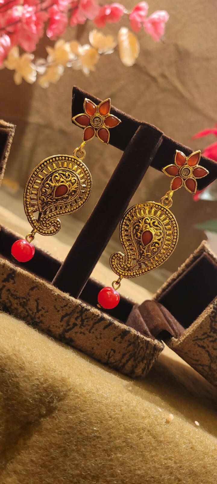 Red dangler earrings